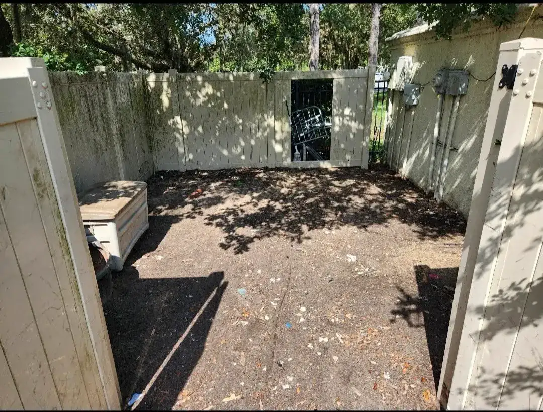 Apartment community bulk collection area cleared after scheduled pickup