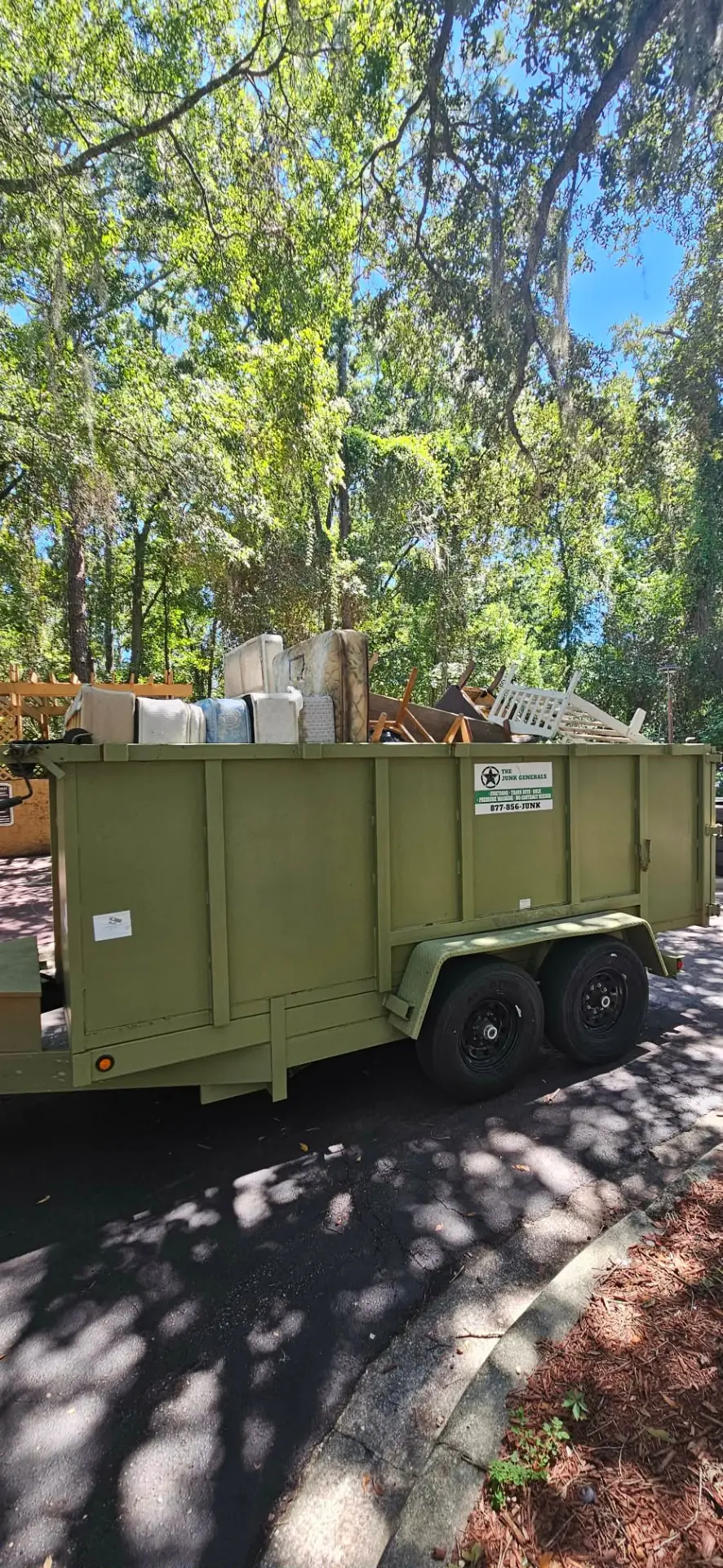 The Junk Generals trailer loaded after a commercial property cleanout